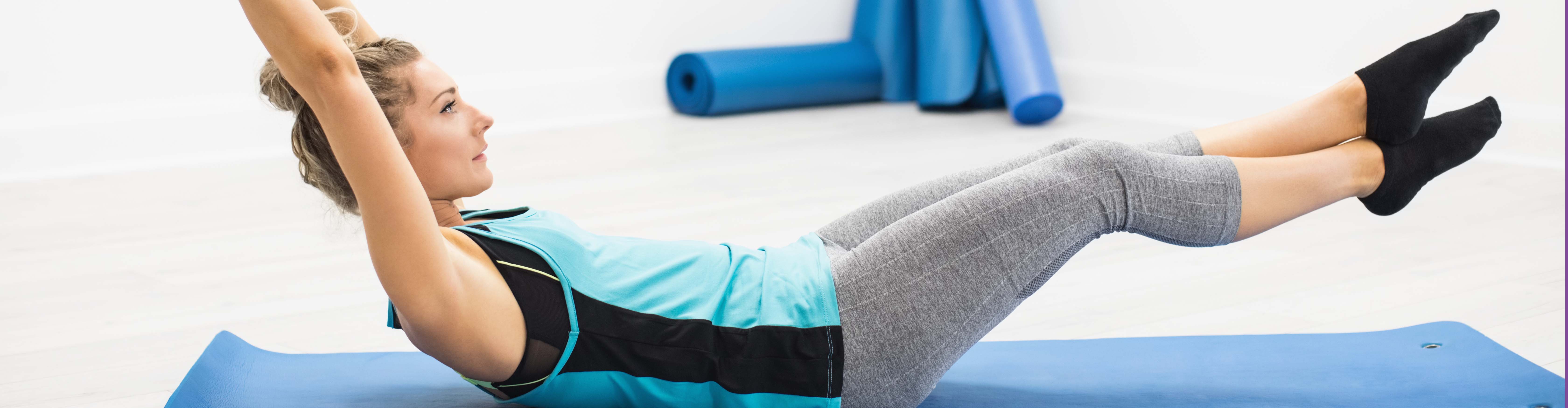 Woman Performing Stretching Exercise